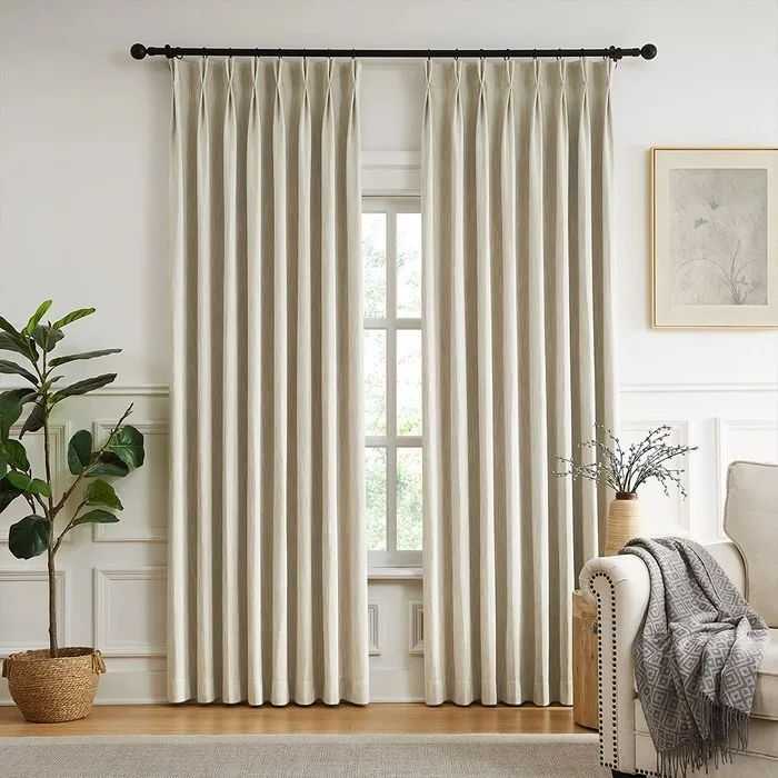 beige vertical striped blackout curtains in a room