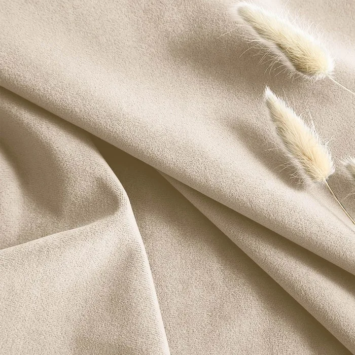 beige velvet fabric and tassel detail