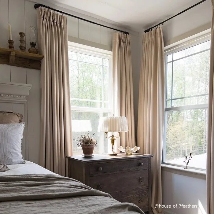 beige velvet curtains in a bedroom