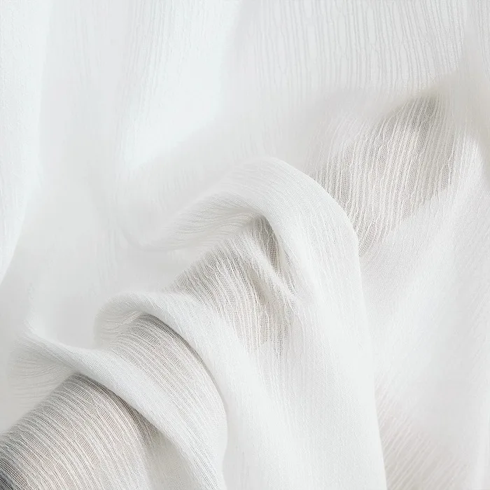 white sheer fabric with subtle linear stripe texture