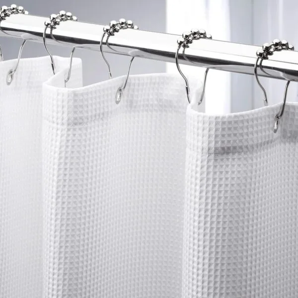 Custom-printed polyester shower curtain with a tropical leaf pattern, showing sharp color reproduction