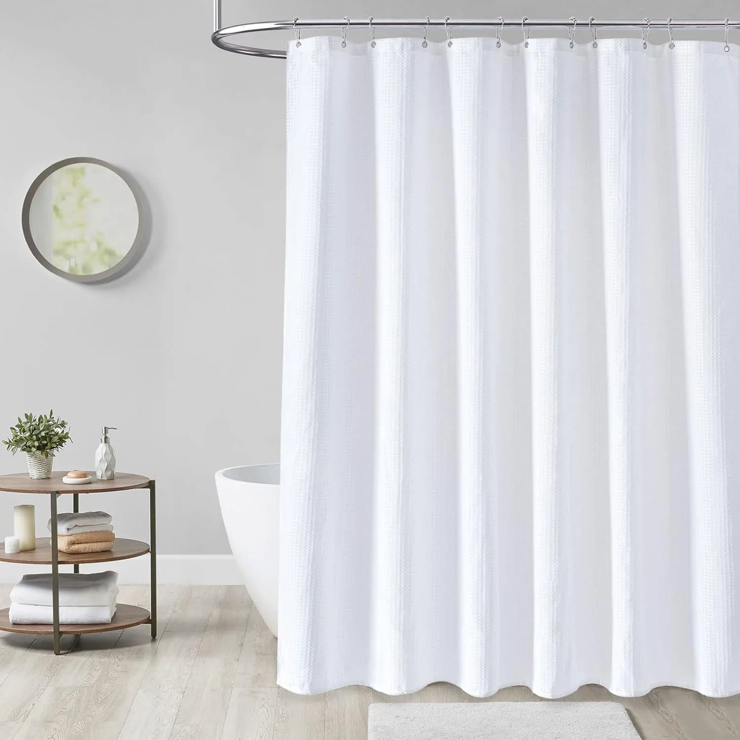 Polyester fabric shower curtain with reinforced header