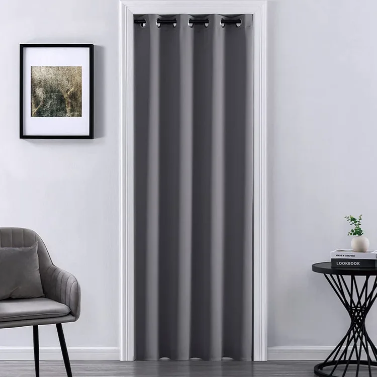 gray grommet door curtain in a room