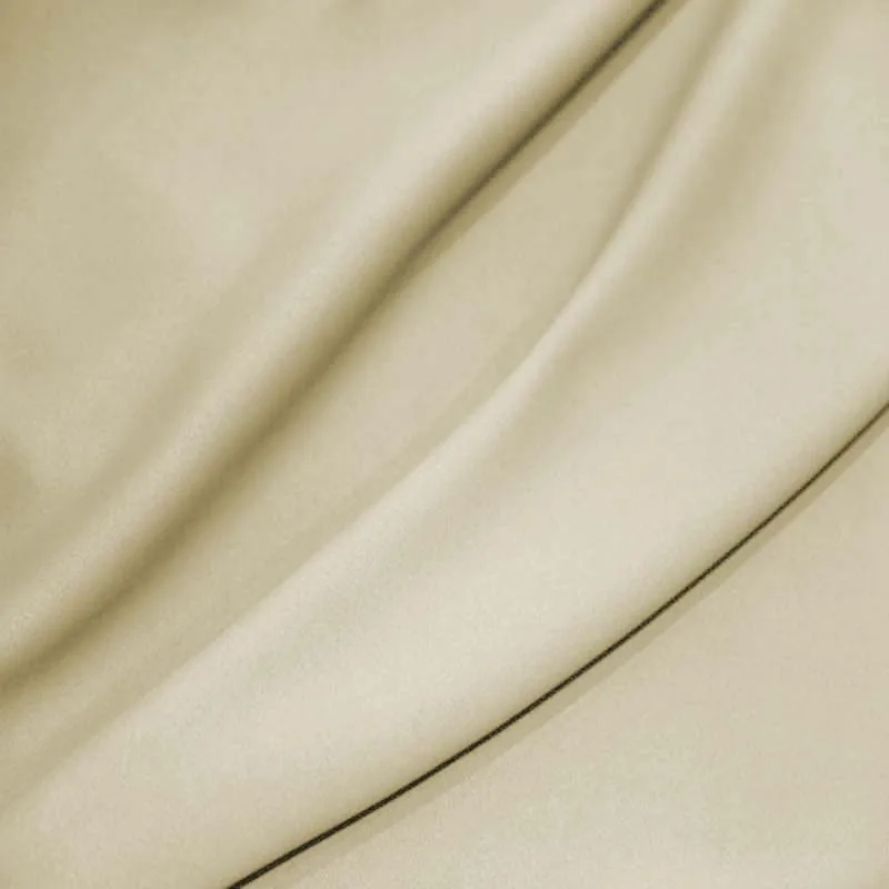 beige curtain fabric folds close-up