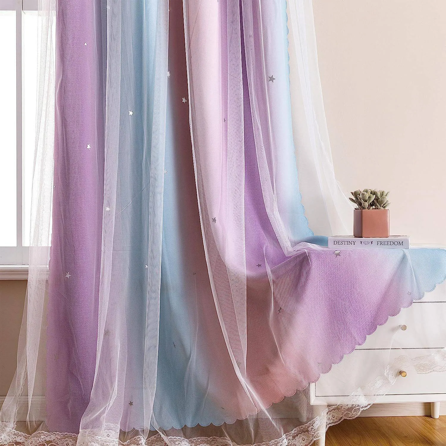 pastel sheer overlay and color-blocked curtain drape