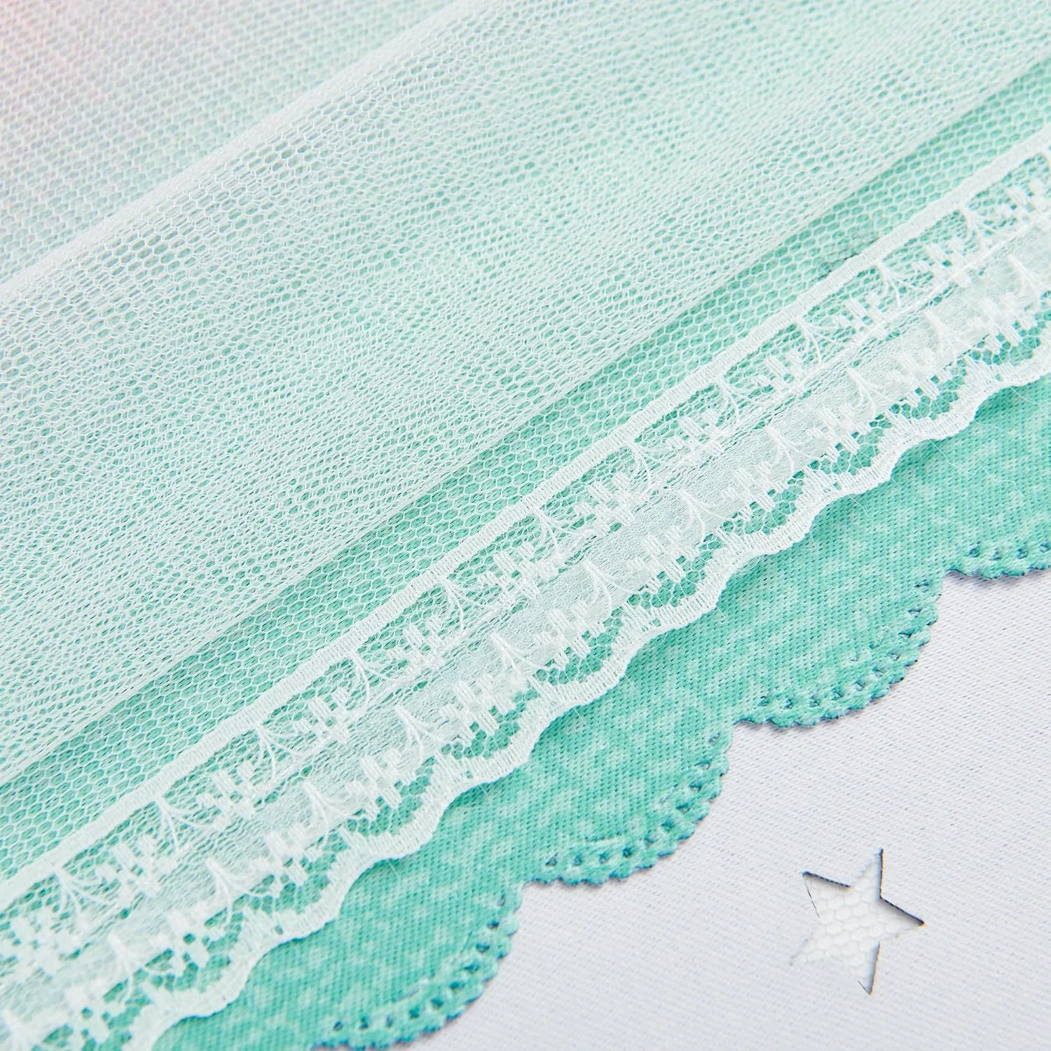 mint sheer overlay with lace edge and star cut-out