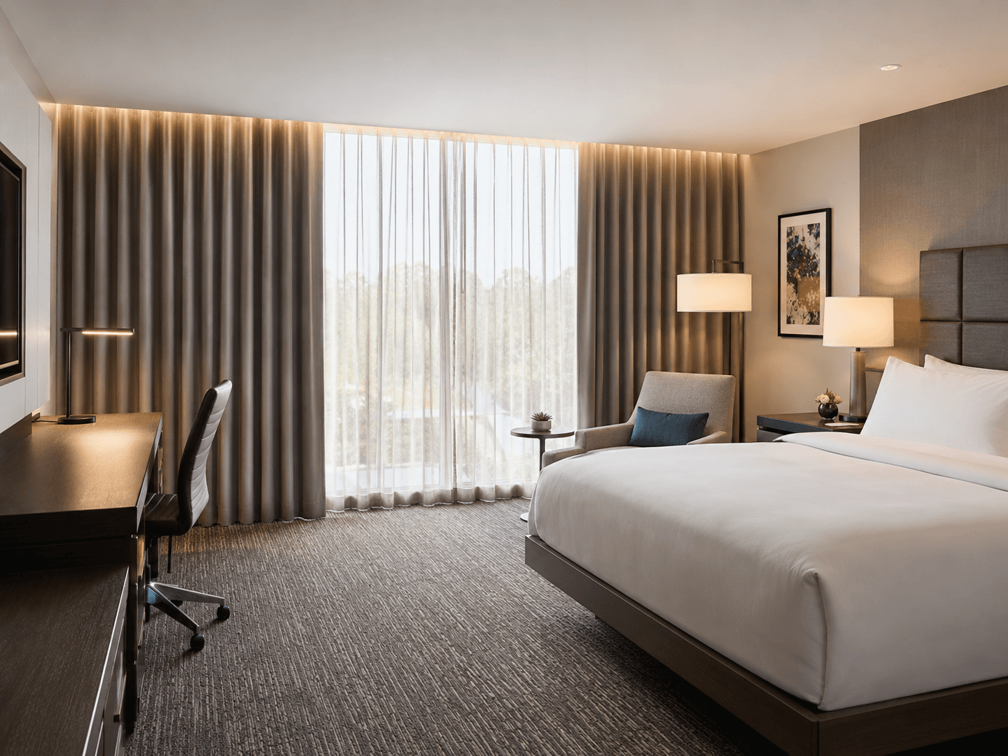 Hotel guestroom with flame-retardant drapery for hospitality projects