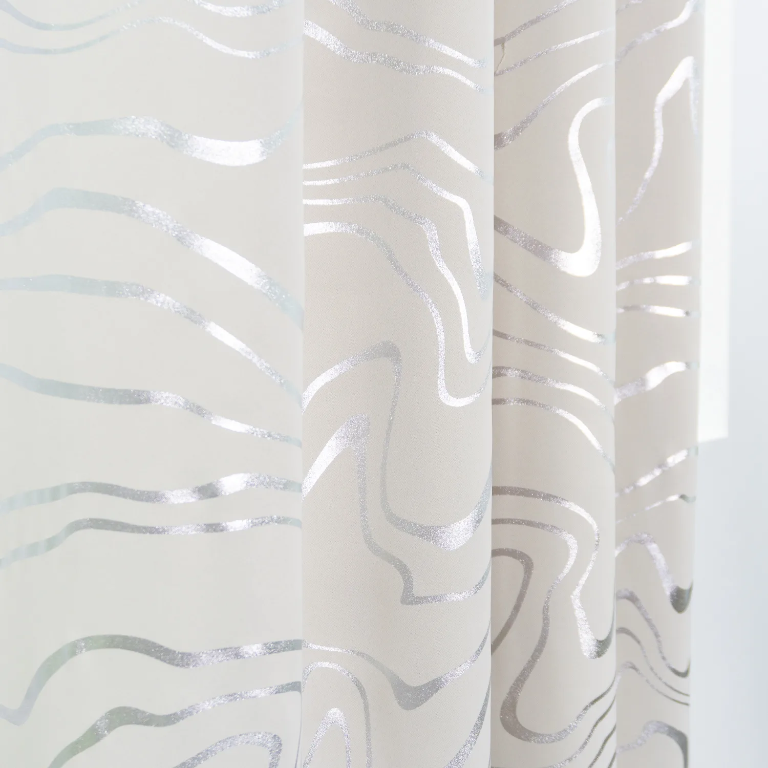 silver wavy foil pattern on curtain panel