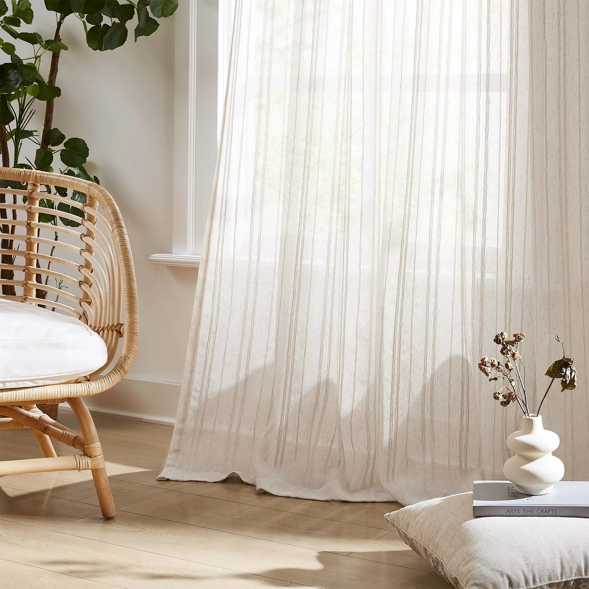wave-texture sheer curtain filtering sunlight