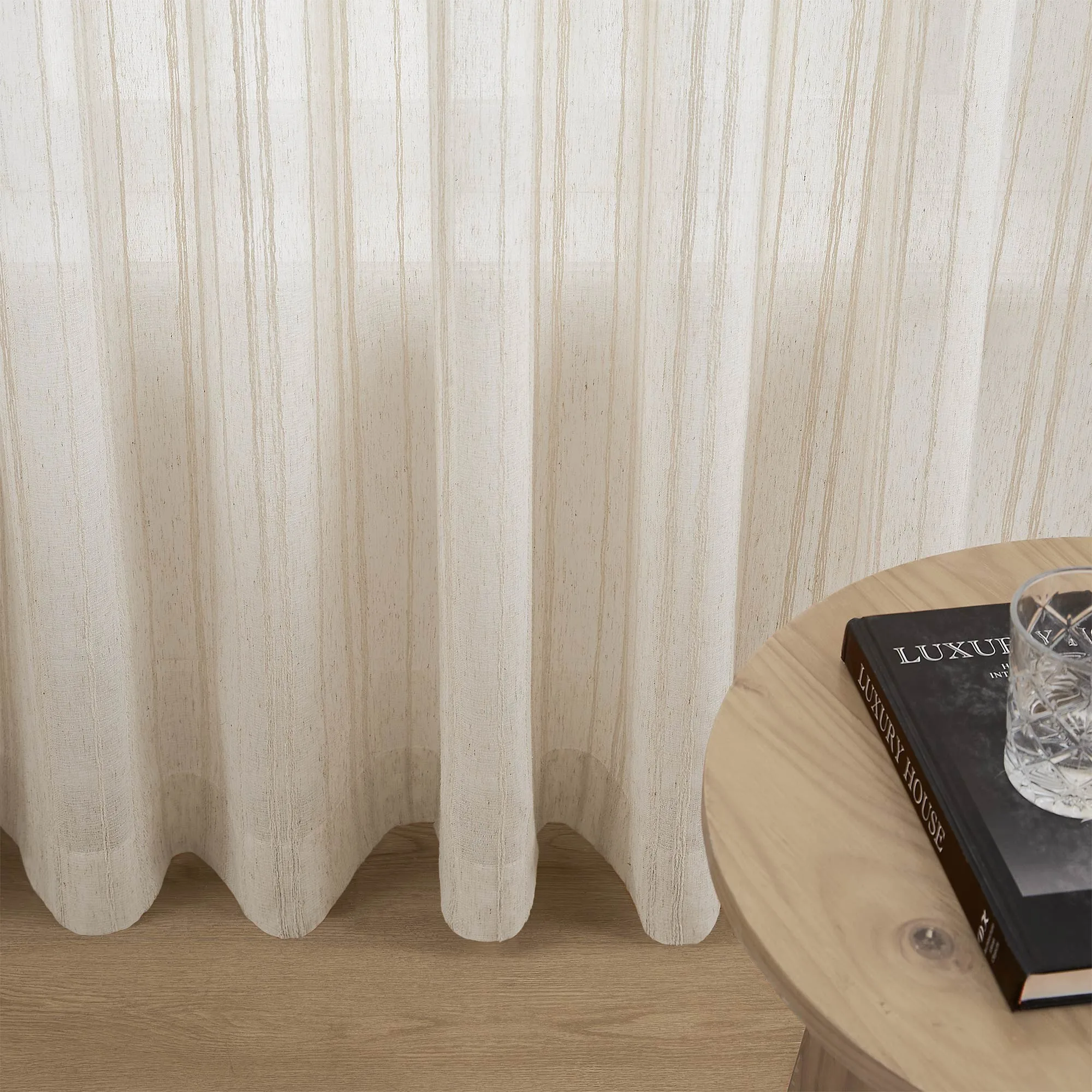linen-look sheer curtain hem in soft daylight