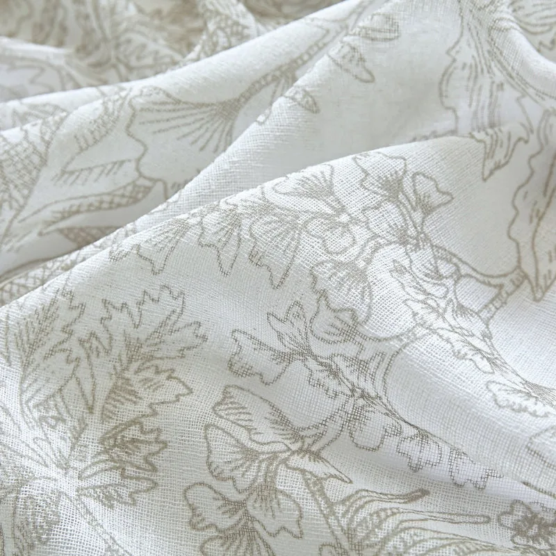botanical print on sheer curtain fabric close-up