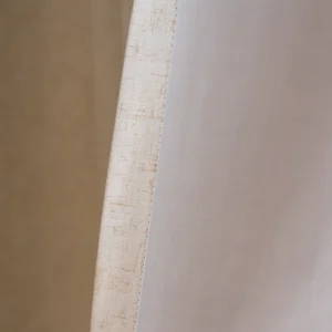 beige curtain fabric face and light-colored backing
