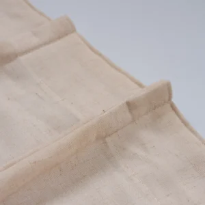 stitched edge detail on linen-look sheer curtain