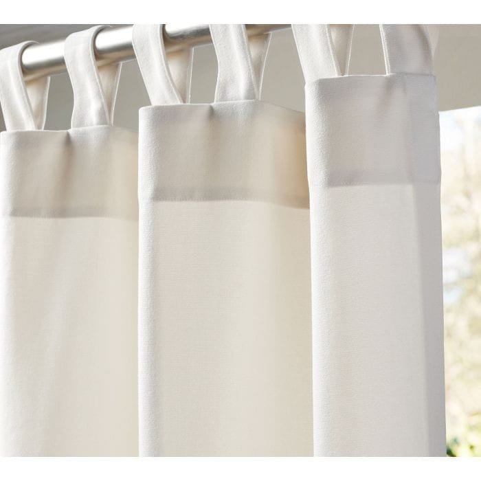 Tab top curtain with 5-7 reinforced bartack tabs per linear meter