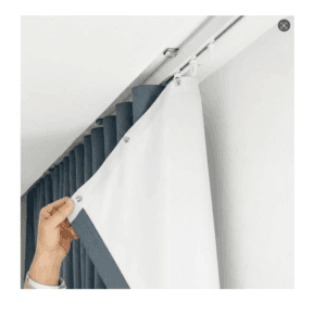 S-Fold curtain heading with tighter wave fold pattern on ceiling-mounted track system