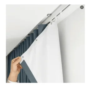 S-Fold curtain heading with tighter wave fold pattern on ceiling-mounted track system