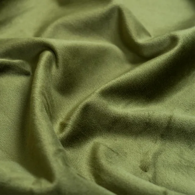 Green velvet drape showing directional surface appearance