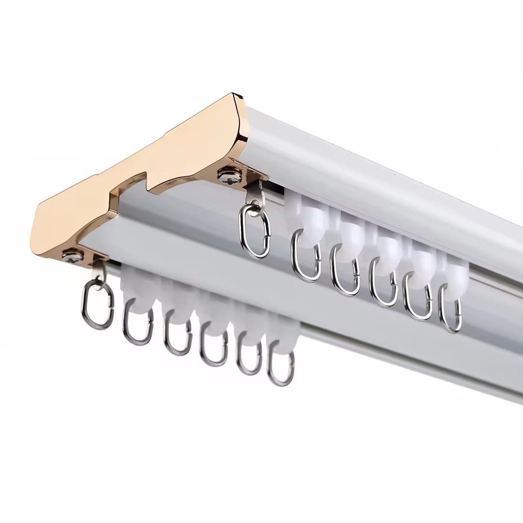 Double curtain track for layering sheer and blackout curtains inside a curtain box